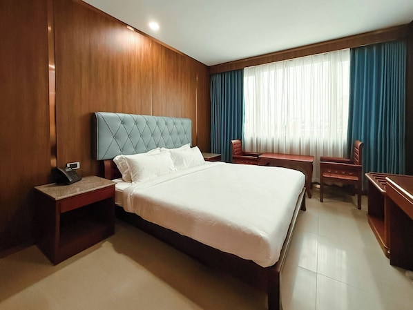 Superior Double Room, City View | Premium bedding, in-room safe, laptop workspace, blackout curtains