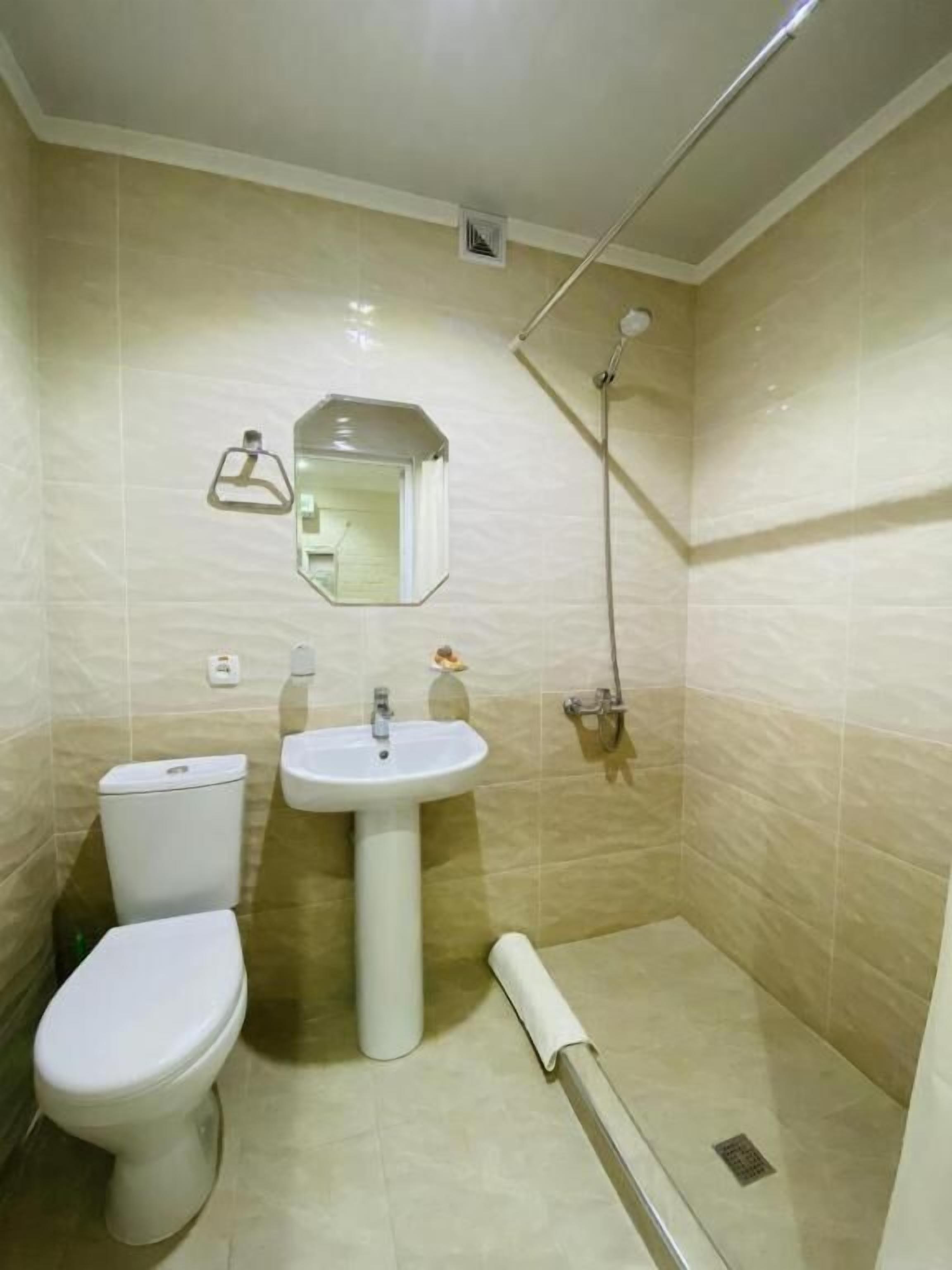 Hair dryer, towels, soap, shampoo