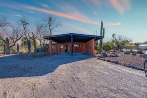 A building with a covered patio, surrounded by desert vegetation. - Mid-Century Desert Galore/Mt.Views/Pool (Tucson)