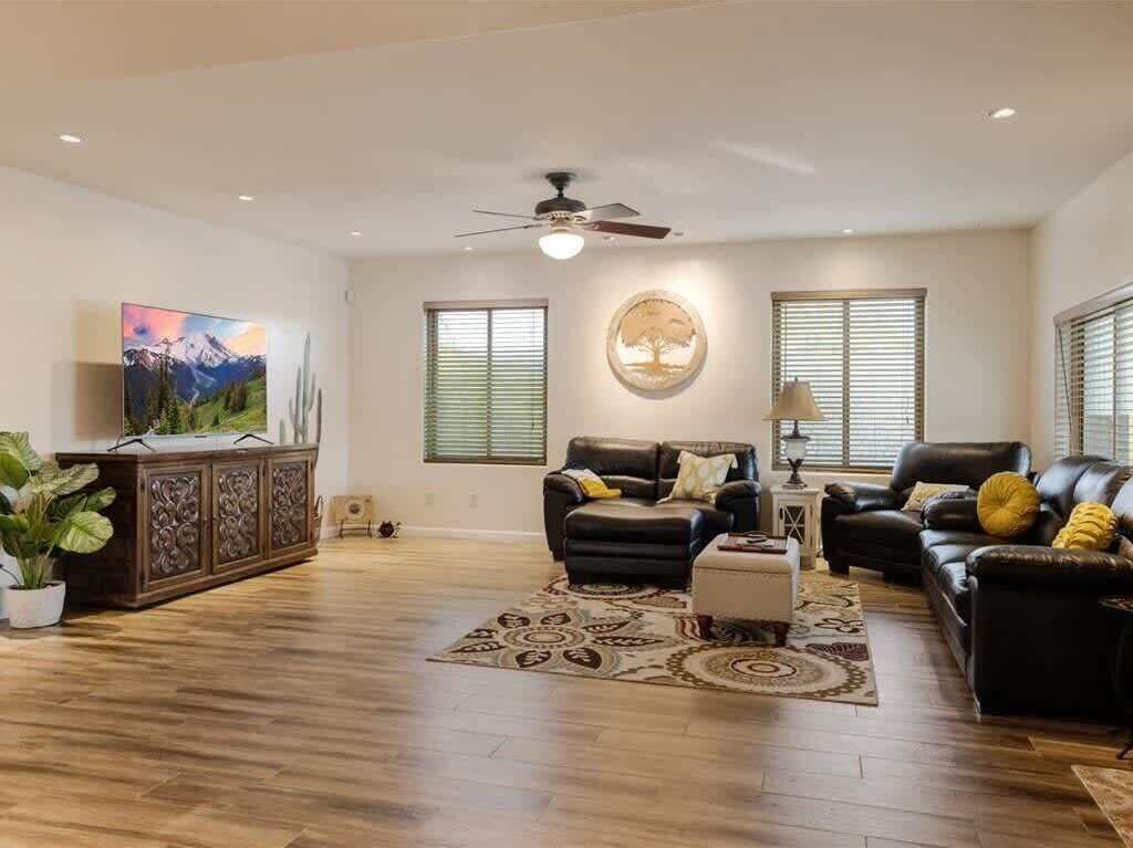 Leather couches with 65" Smart TV.