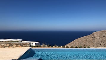 Outdoor pool, pool umbrellas, pool loungers