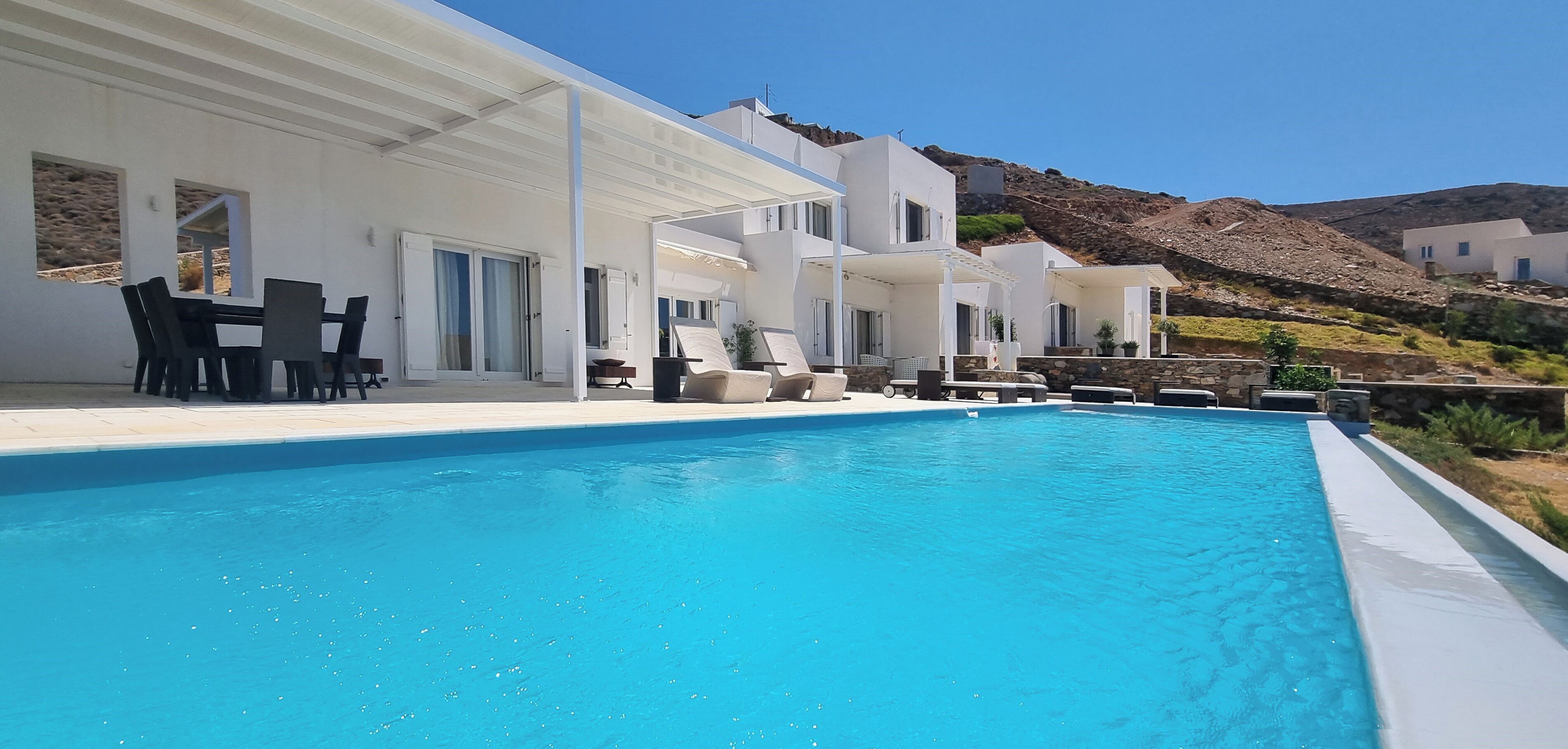 Outdoor pool, pool umbrellas, pool loungers