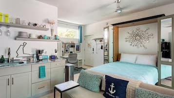 Desk, iron/ironing board, travel crib, WiFi (free)