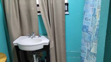Shower, towels, soap, toilet paper