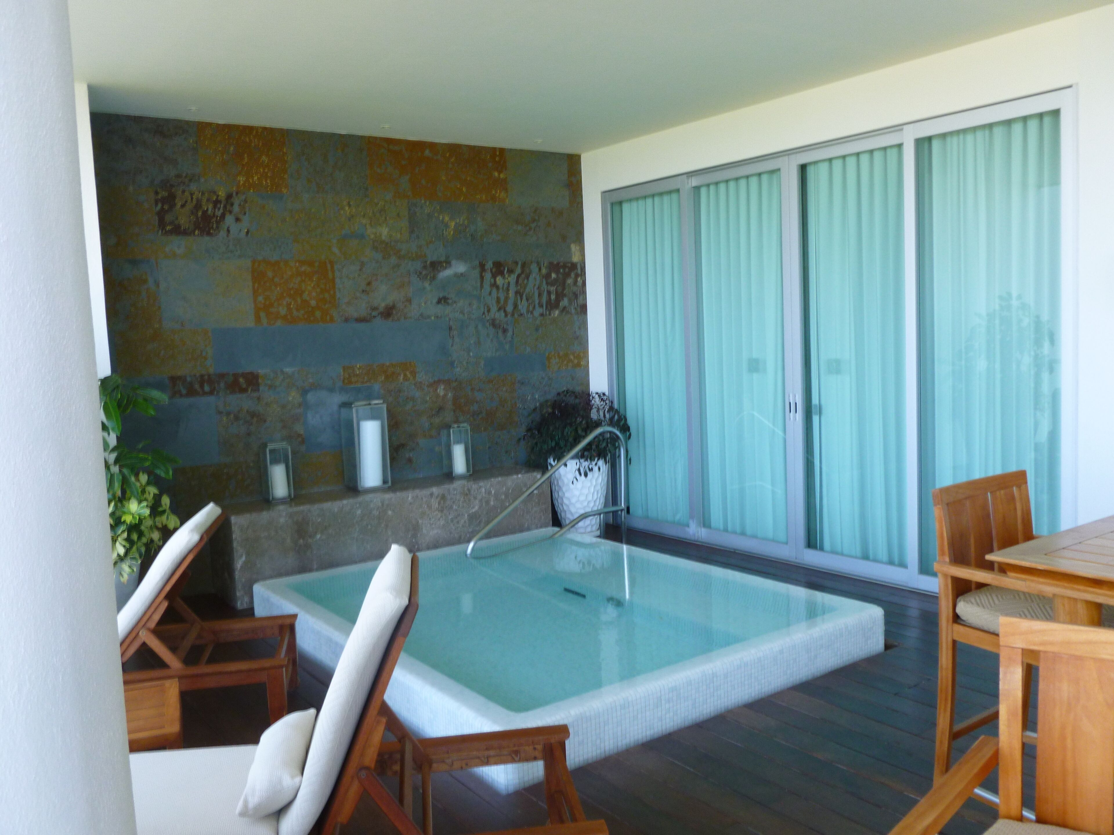 Condo Deluxe, vista al océano | Spa | Sauna, tina de hidromasaje, baño de vapor y masajes de tejido profundo 