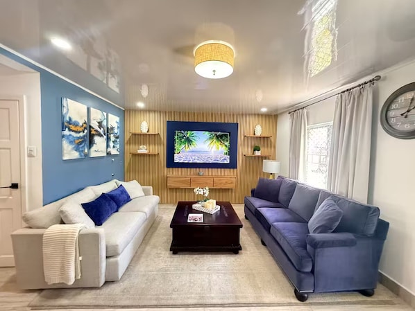 Living area - Seas The Day, 5BR Sleeps 14, Pool, Ocean Views (Crown Point)