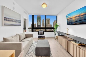 Familienapartment, Balkon, Stadtblick | Wohnbereich