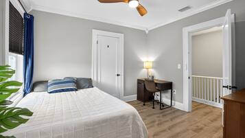 Desk, laptop workspace, blackout curtains, free WiFi