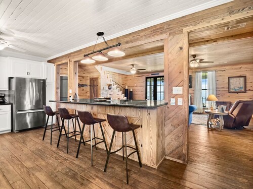 Lakefront Luxury  with Private Dock, Game Room, Sunset Views & Sleeps 14