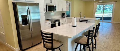 Coffee/tea maker, fridge, microwave, oven