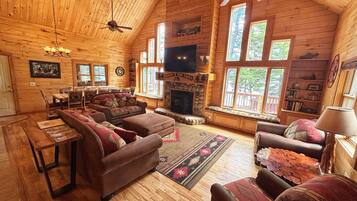 Smart TV, fireplace, foosball, books