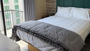 Superior Single Room, Balcony | Desk, laptop workspace, blackout curtains, iron/ironing board - Skylux Hotel Long Island City (Long Island City)