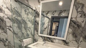 Superior Single Room, Balcony | Bathroom | Shower, hair dryer, towels, soap - Skylux Hotel Long Island City (Long Island City)
