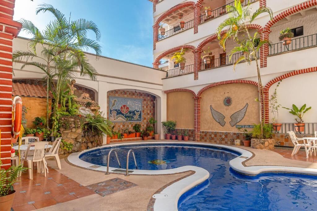 Outdoor pool, open 9:00 AM to 8:00 PM, pool umbrellas, sun loungers
