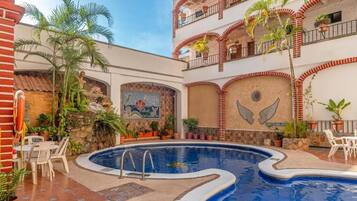 Outdoor pool, open 9:00 AM to 8:00 PM, pool umbrellas, sun loungers