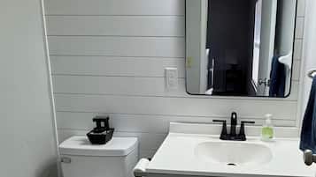 Hair dryer, towels, soap, toilet paper