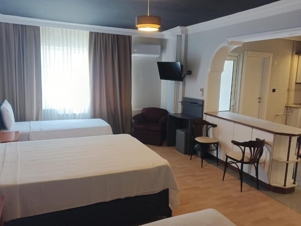 Superior Quadruple Room, City View | Desk, free WiFi