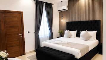 Deluxe Studio Suite, City View | Premium bedding, down comforters, in-room safe, desk
