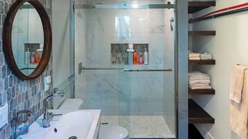 Shower, hair dryer, towels, soap