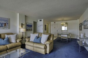 Living area - Oceanfront Condo • Panoramic Views • Steps to the Beach — Coastal Dream Paradise (Ormond Beach)