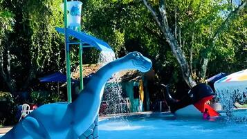 7 outdoor pools, open 9:00 AM to 10:00 PM, pool umbrellas, sun loungers