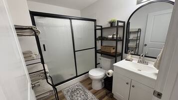 Hair dryer, towels, soap, toilet paper
