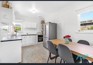Private kitchen - Cosy retreat for a family getaway. (St Leonards)