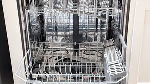 An open dishwasher with multiple racks and a control panel. - Newly Renovated Studio Apartment in Dowtown Roanoke (Roanoke)