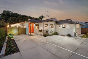 A residential house with a front porch, a garage, and a driveway. - Entire Private Home with 3 King Beds, Gated Yard, 4 Parking, Ranch Style (La Mesa)