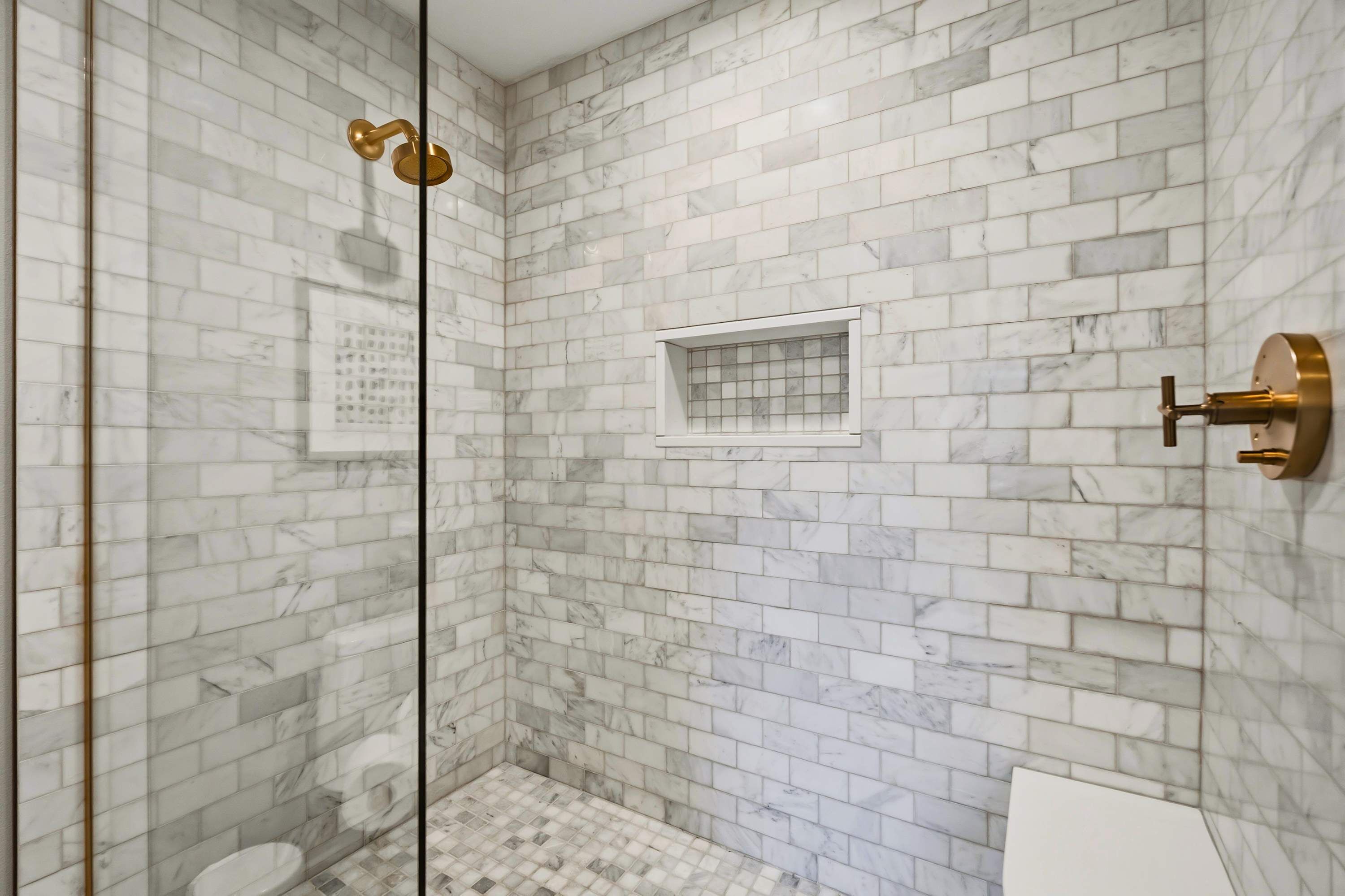 Shower, hair dryer, towels, shampoo