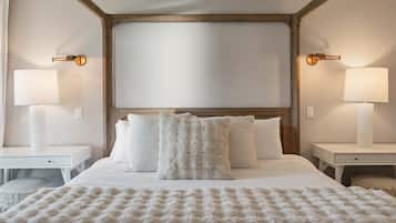 Primary bedroom with a four-poster canopy bed
