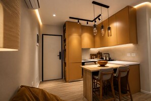 Junior Apartment, Balcony, City View | Dining - New Bazaar Tirana Suites (Tiranë)
