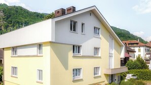 A multi-story residential building with a flat roof, multiple windows, and a balcony. - Casa Viva, (Bad Ragaz), by Interhome (Bad Ragaz)