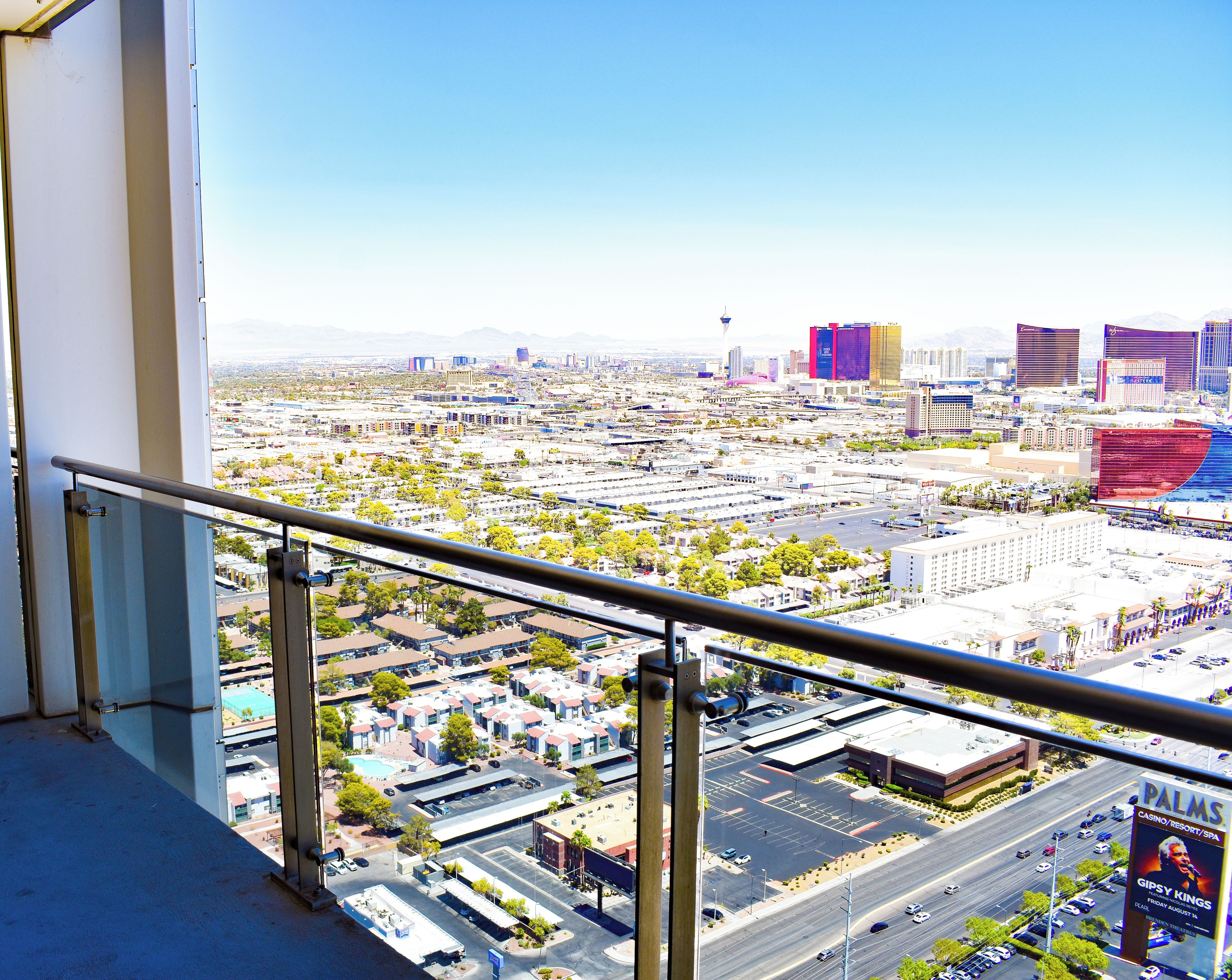 A cityscape with a prominent casino and resort building.