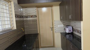 Family Apartment, Balcony, City View | Private kitchen | Oven, cookware/dishes/utensils - Govinda Nivas Homestay (Tirupati)