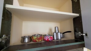 Family Apartment, Balcony, City View | Private kitchen | Oven, cookware/dishes/utensils - Govinda Nivas Homestay (Tirupati)
