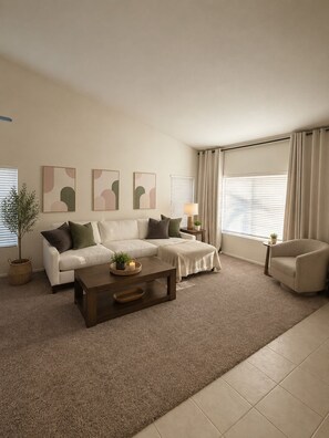 A living room with a sofa, armchair, coffee table, and artwork on the wall. - Modern Palm Springs Oasis - Heated Pool, Spa & Mountain View’s - Permit # 053440 (Palm Springs)
