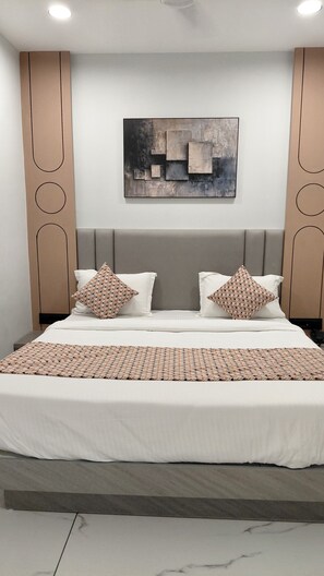 In-room safe, desk, laptop workspace, iron/ironing board - Hotel Grand Shivaay (Ahmedabad)