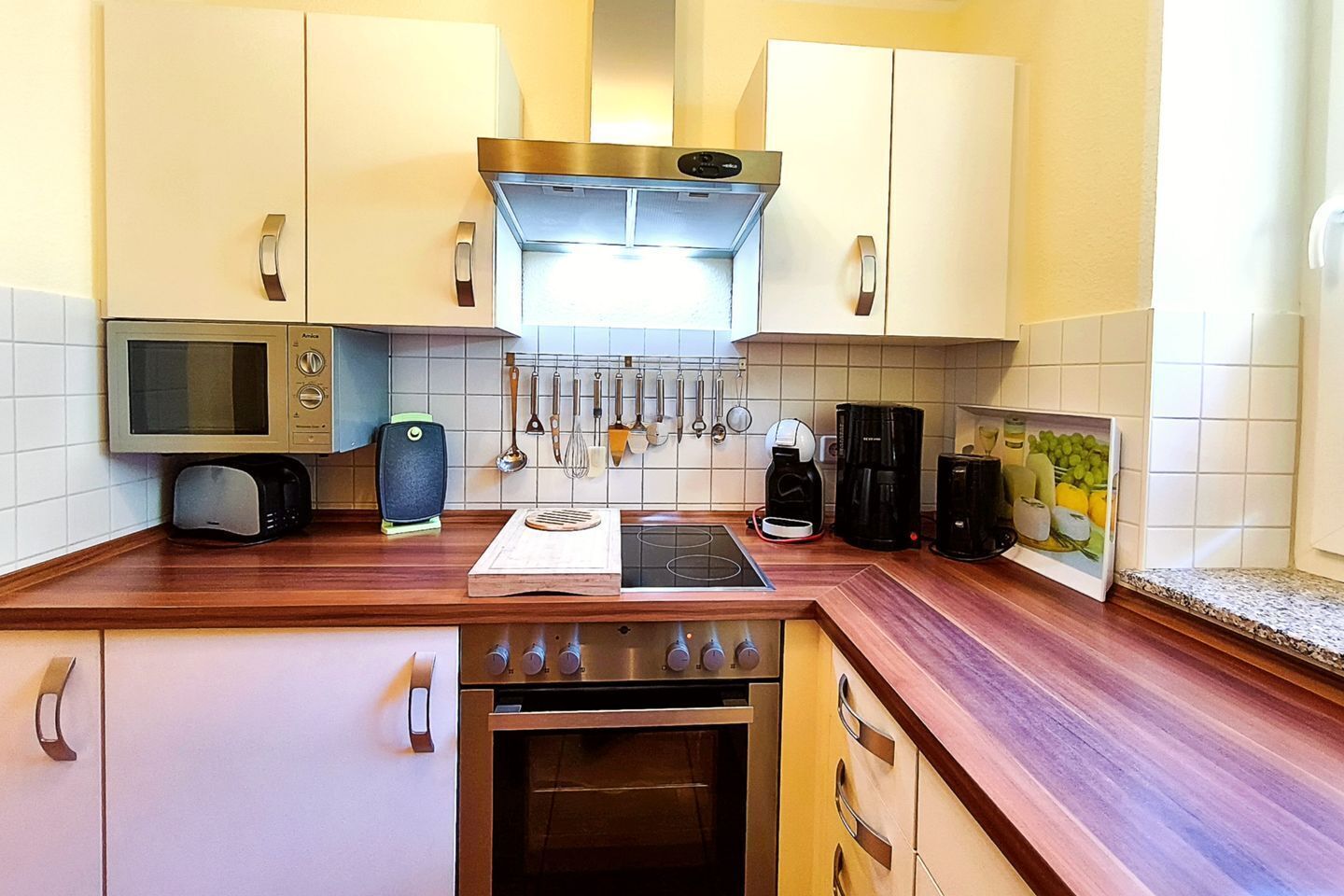 Coffee/tea maker, fridge, microwave, oven