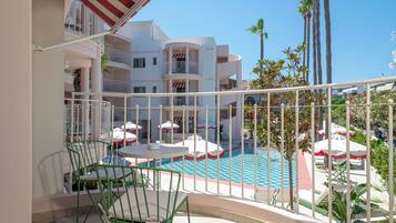 Junior Suite, Balcony, Pool View | Outdoor dining