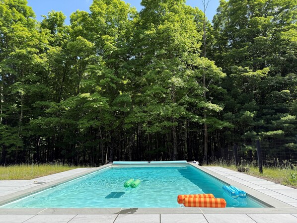 Pool - Immerse yourself in nature at this unique two-home compound blending high-end architecture with the mountains. Features a main house for 6, a private glass cabin for 2, a heated saltwater pool, and a central fire pit. (Palenville)