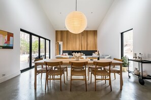 Dining - Immerse yourself in nature at this unique two-home compound blending high-end architecture with the mountains. Features a main house for 6, a private glass cabin for 2, a heated saltwater pool, and a central fire pit. (Palenville)