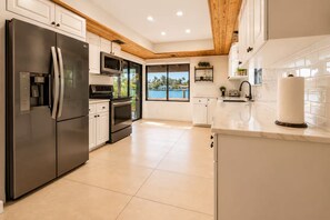 Fridge, microwave, oven, stovetop - Villa Serenova, Spacious 4BR Oasis with Private Pool (North Bay Village)