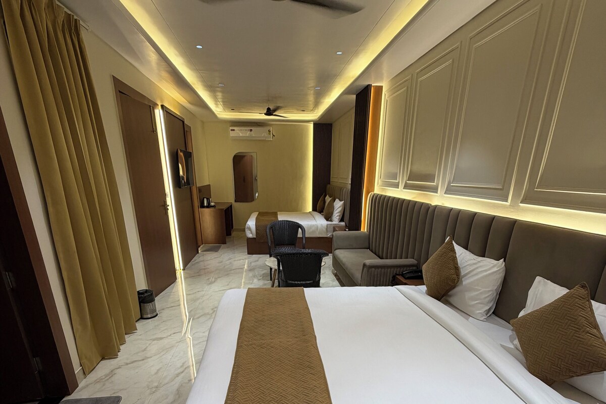 Kamar Quadruple Deluks | Meja kerja, tempat tidur lipat/tambahan, Wi-Fi gratis, dan seprai linen