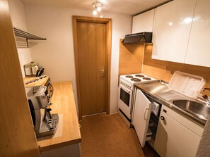 Private kitchen - Ferienwohnungen Felder, (Splügen), by Interhome (Splügen)
