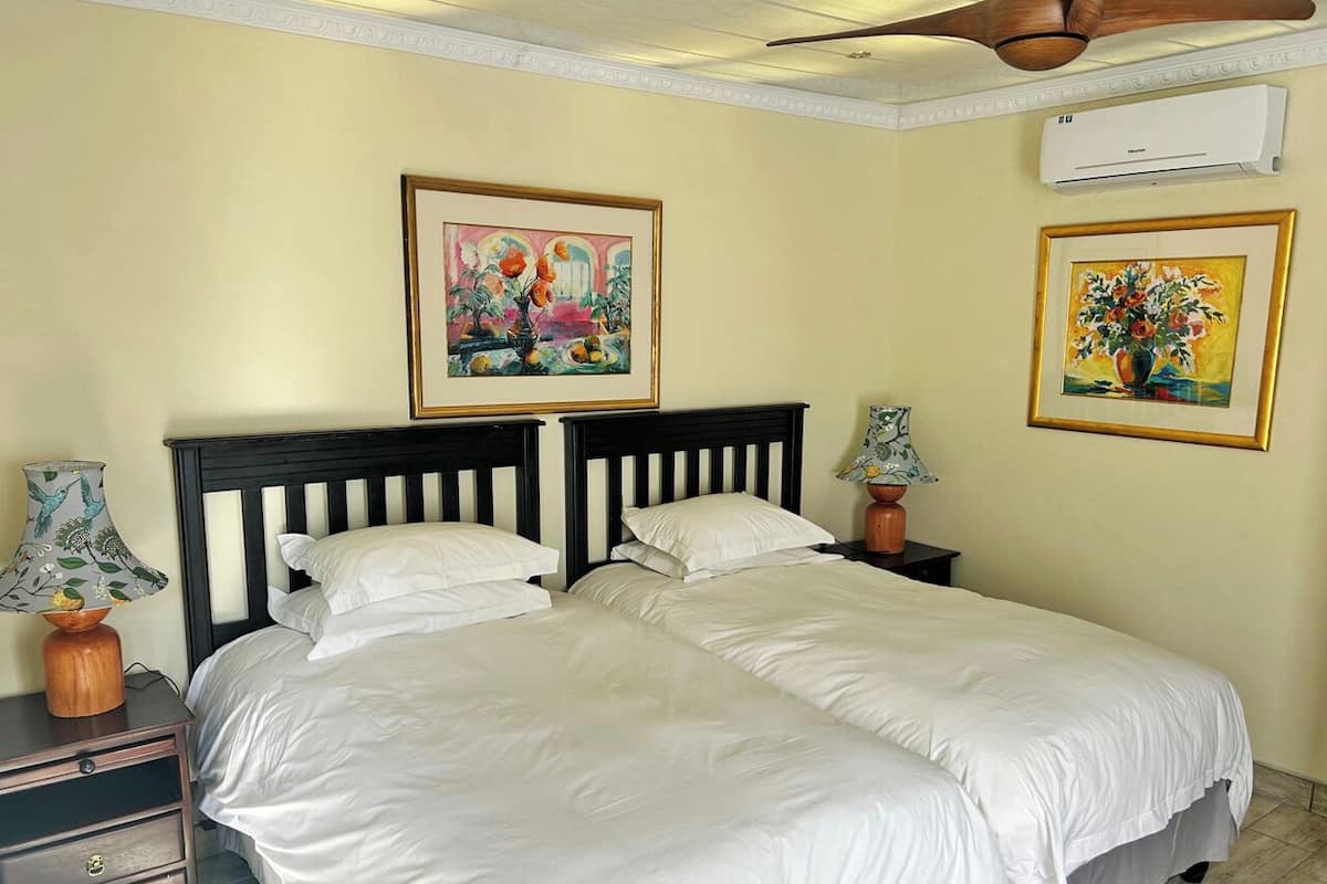 Deluxe Twin Room, Patio, Garden View | In-room safe, desk, laptop workspace, soundproofing