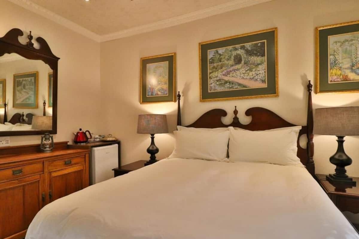 Deluxe Double Room, Patio, Garden View | In-room safe, desk, laptop workspace, soundproofing