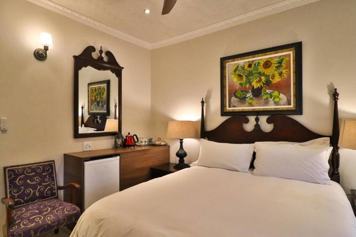 Deluxe Double Room, Patio, Garden View | In-room safe, desk, laptop workspace, soundproofing
