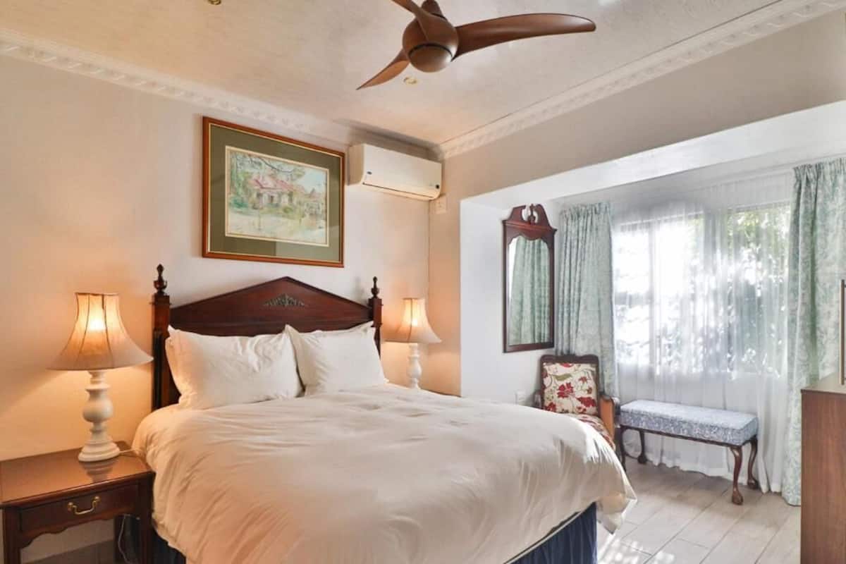 Deluxe Double Room, Patio, Garden View | In-room safe, desk, laptop workspace, soundproofing