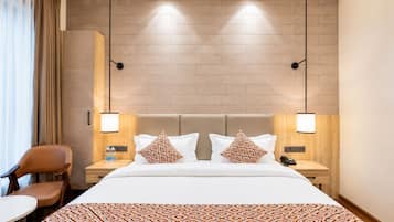 Deluxe City View Room | Hypo-allergenic bedding available, minibar, in-room safe, desk